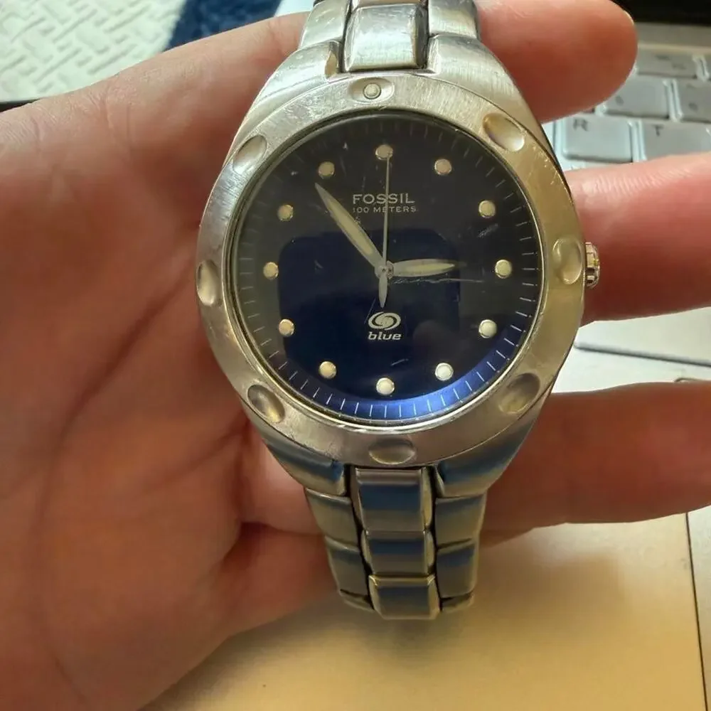 Fossil blue dial watch with silver band